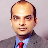 Dr Navneet Tripathi