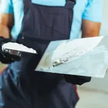 Bear Patching drywall